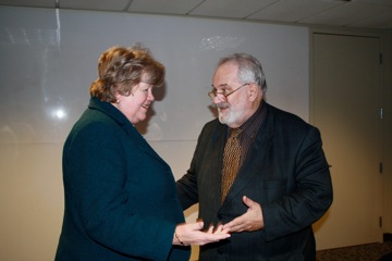 David shares ideas with Jean MacCormack, the Chancellor of the University