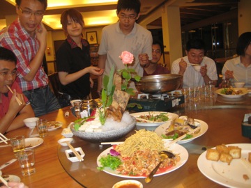 more food comes round the lazy susan (the rotating centre of the table)