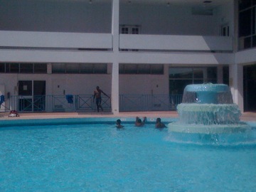 West Indies players take a swim in the hotel pool.